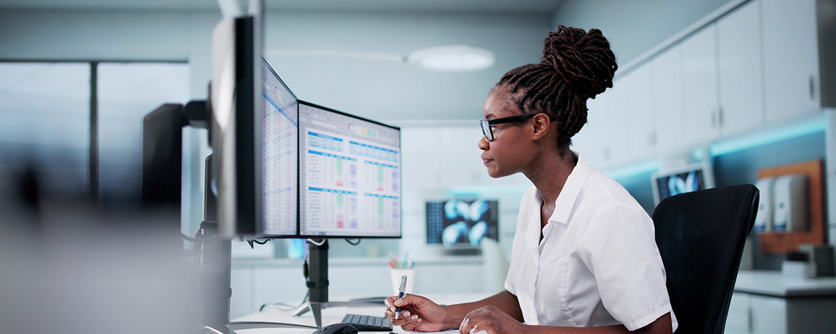 woman working to ensure she avoids medical billing mistakes using a physician-led consultancy