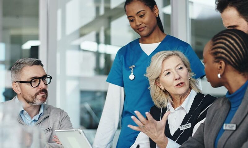 doctors discussing how they can avoid fraud with their medical billing