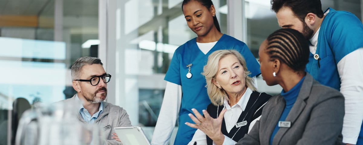 doctors discussing how they can avoid fraud with their medical billing