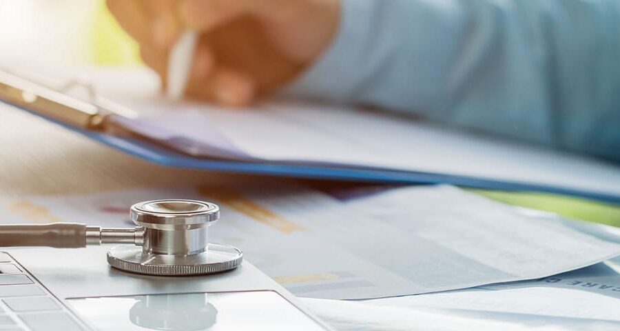 doctor reviewing his practice's medical billing process