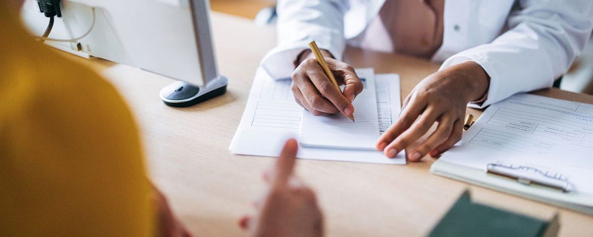 doctor and patient discussing medical billing