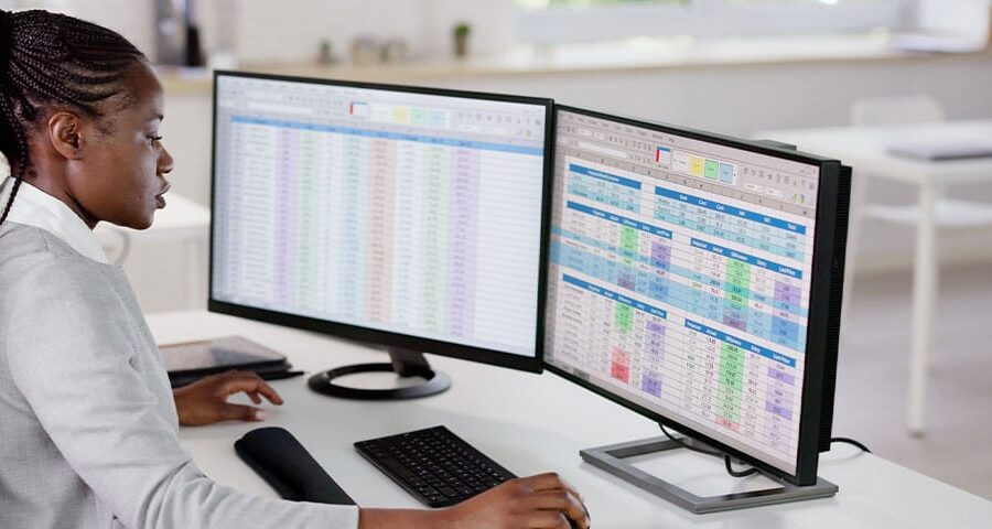 doctor reviewing medical coding on a computer