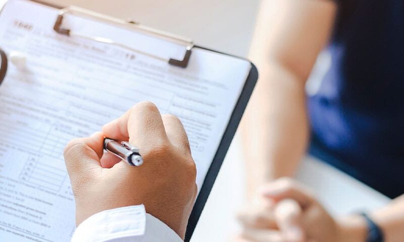 doctor getting patient documentation for medical billing