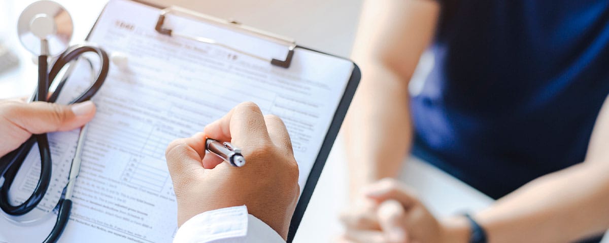 doctor getting patient documentation for medical billing