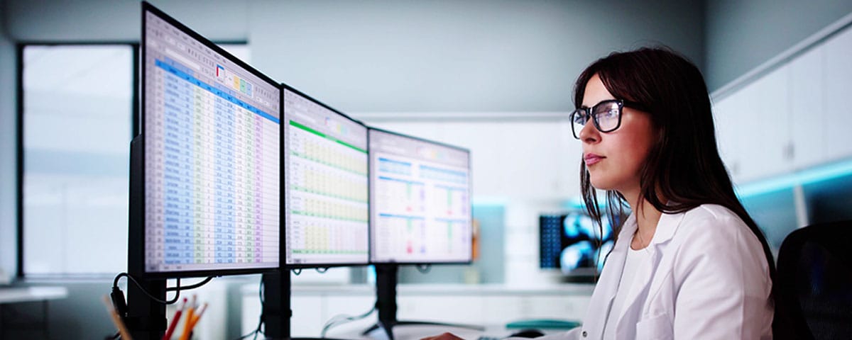 doctor reviewing the medical billing analytics data for her practice