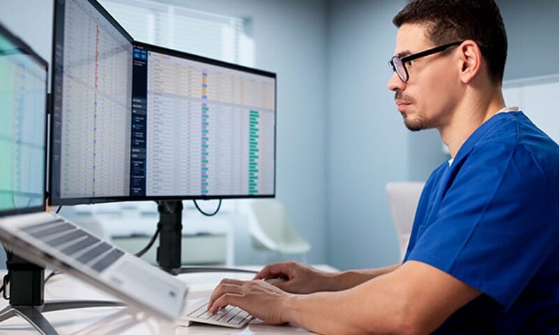 doctor working to reduce claim denials in his medical billing process