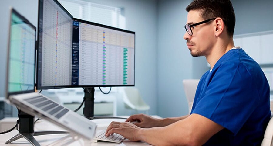 doctor working to reduce claim denials in his medical billing process