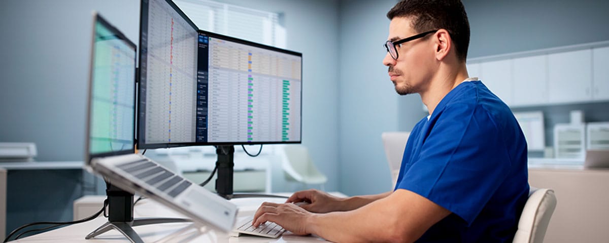 doctor working to reduce claim denials in his medical billing process